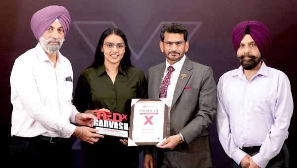 Dr. Opinder Singh, Registrar, Dr. Swaran Singh Randhawa, Dean, College of Veterinary Science, Dr. R. S. Sethi, Organizer of TEDxGADVASU and Dean, College of Animal Biotechnology with  first-year student of the COABT Ms. Gurchetan Kaur